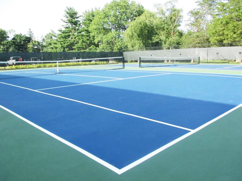 Tennis and pickleball courts top off the private golf club amenities available at Copper Hill Country Club.